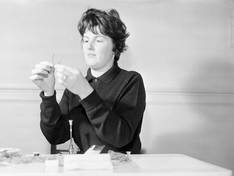Anna Bertram tying fishing flies in her Colinton Road home in March 1963.