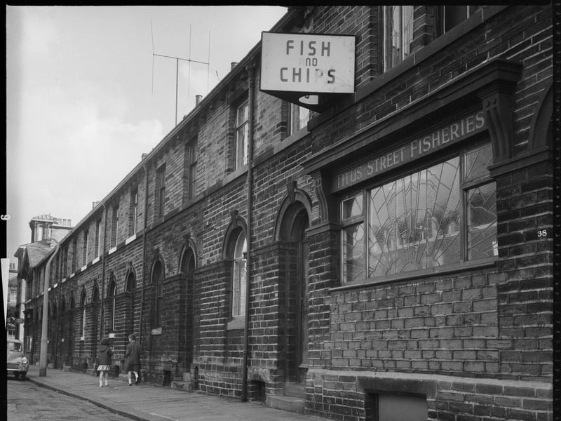 A fish and chip shop at the end of a row of terraced houses on Titus Street, Saltaire, Shipley, Bradford, pictured during the late 60s or early 70s.