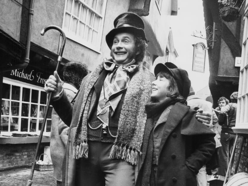Actors Roy Dotrice and Simon Bell in costume on the set of the TV series 'Dickens of London', in York, in 1976