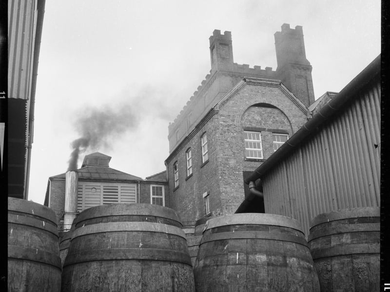 Barrels lined up at the Tower Brewery, Tadcaster, in the early 70s. The brewery is today operated by Molson Coors.