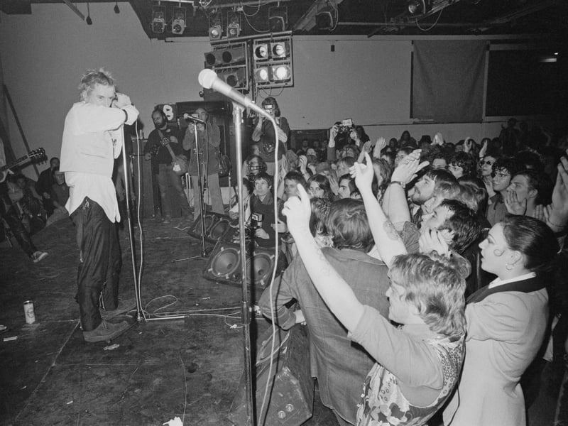 The Sex Pistols perform at Leeds Polytechnic during their 'Anarchy Tour' in December 1976