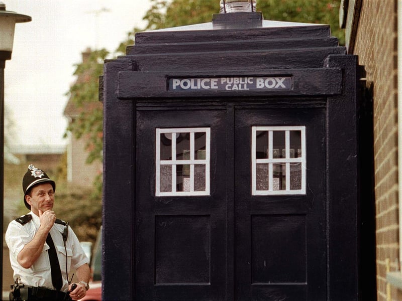 A perplexed PC John Knowles is pictured looking at the latest edition to Wetherby Police Station - a replica police box, dubbed the 'Tardis'.