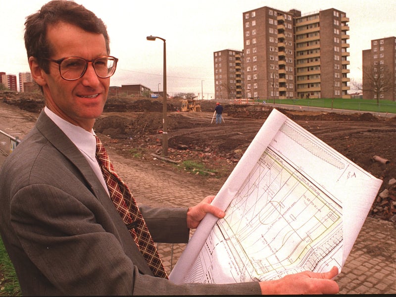 Head teacher John Hosewood looks at new all-weather pitches being constructed in April 1996.