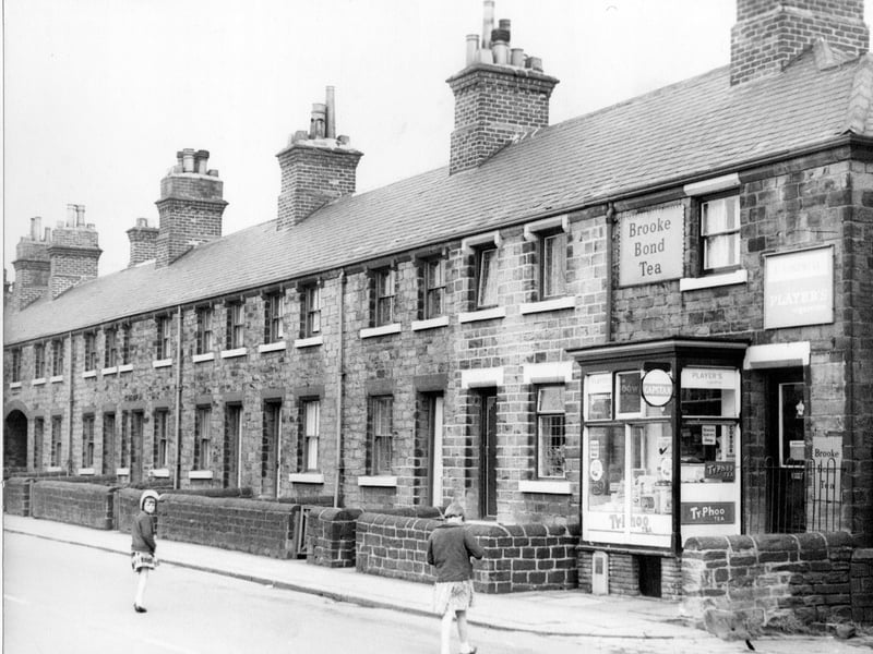 Springfield View, which consisted of a row of terraced houses on Victoria Road. To the right are the premises of F. Cardwell, General Store. Pictured in April 1967.