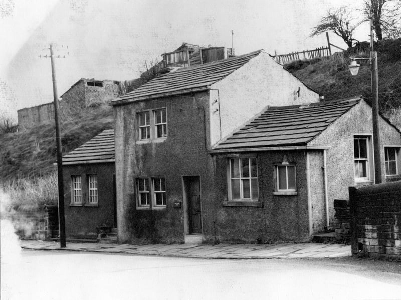Crank Mill offices on Station Road in April 1967. Crank Mill was built by Lord Dartmouth for the Webster family in 1790. Another building and fencing in a poor state of repair are behind the office.