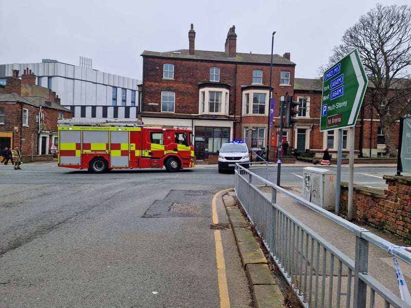 Emergency service at the scene on A660 Blenheim Terrace
