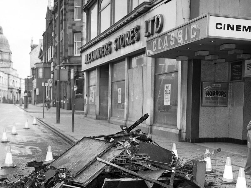 Charred and water-damaged fittings from the Classic cinema lie on Nicolson Street, Edinburgh, after a fire in April 1979