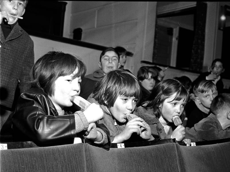Children eating ice lollies at a special performance of The Sound of Music, at the Odeon cinema in Edinburgh, in 1965