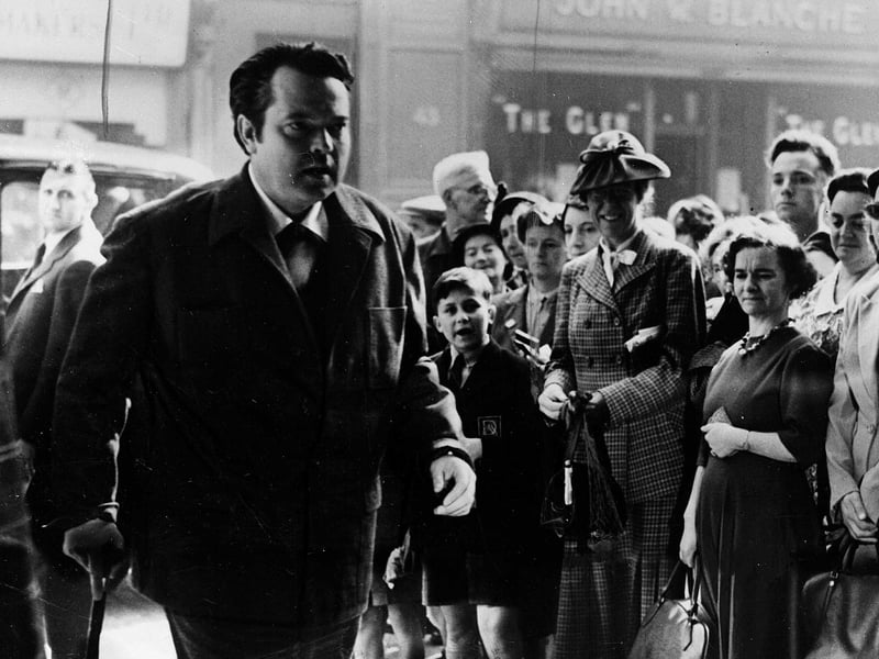 The actor and director Orson Welles arrives at the Cameo Cinema during the 1953 Edinburgh Film Festival to give a lecture in which he declared that 'the film industry is dying'