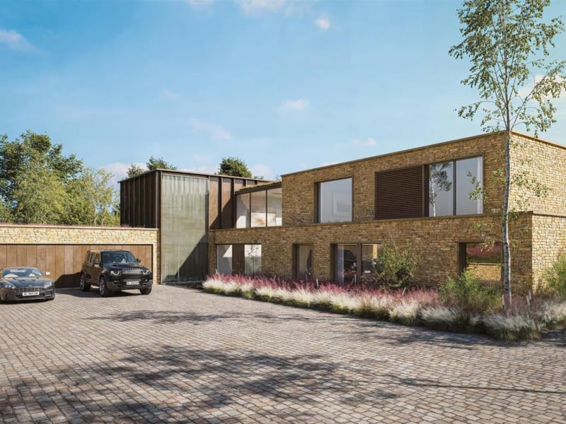 A huge drive and garage.