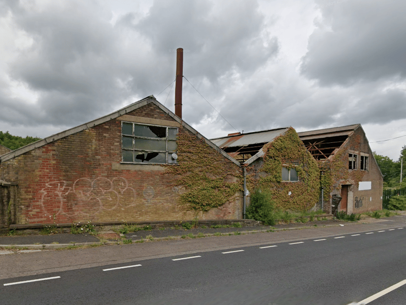The former factory buildings are still standing.