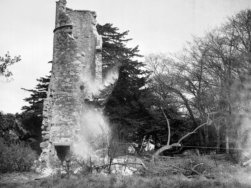 Muirhouse Towers, the only remains of a 17th century mansion, being demolished in April 1954.