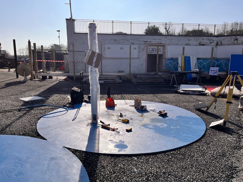 The outdoor shower bases have been painted blue - same as the pool. A plumber is currently installing the actual showers.
There will be four in total.