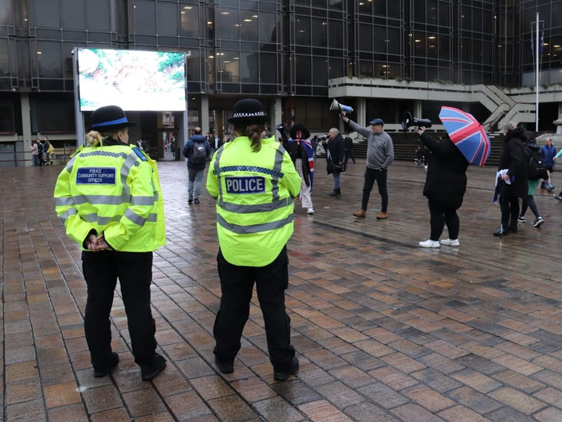 Police monitoring the counter-protestors in Guildhall Square