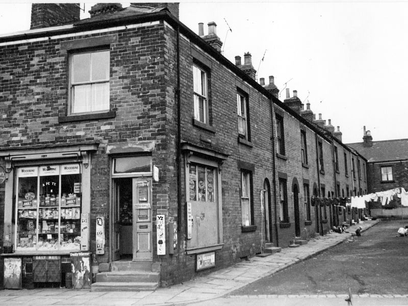 Barker Square in August 1968. Number 1 in the foreground is a general store at the corner with Commercial Street.
