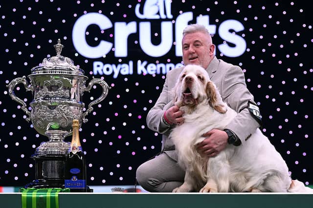 Bruin and Lee Cox pose with the trophy.