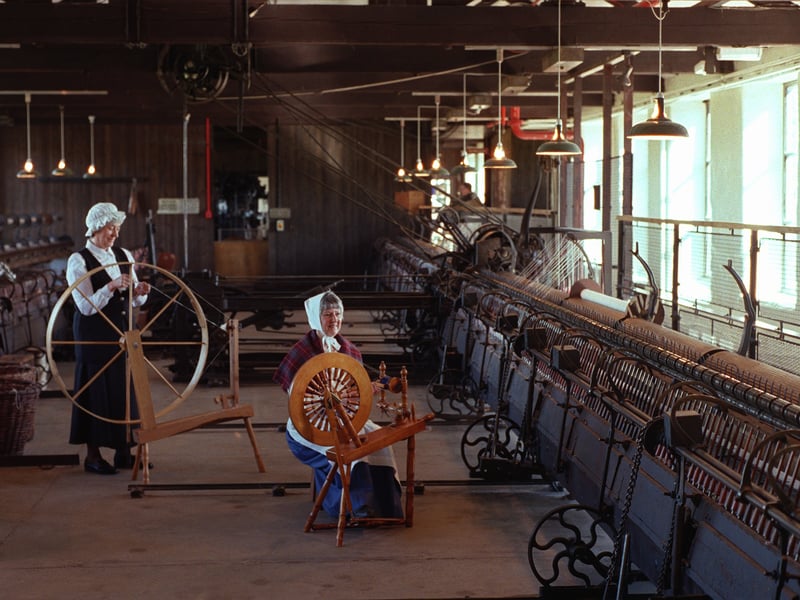 Two members of the Spinners of Aire dressed in costume at the Leeds Industrial Museum at Armley Mills. They are Gwenda Bloor, left and Maureen Morris.