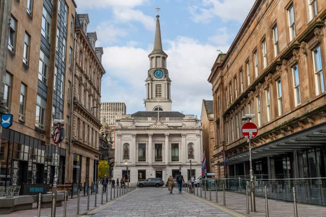 Hutchesons' Hall, or Hospital, on Ingram Street, looking north along Hutcheson Street, 1955. The original Hutchesons' Hospital was demolished in 1795 to make way for the laying out of Hutcheson Street. The building depicted here was designed by David Hamilton and completed in 1805 at the head of the new street. The distinctive octagonal spire is adorned with a clock and dial plate and stands 150 feet tall.