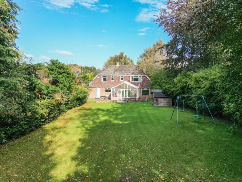 This four-bedroom detached home sits on a generous plot with a long south-facing garden and in-and-out driveway. Offering about 2,400 sq ft of space, the property presents strong potential for renovation or extension subject to planning.