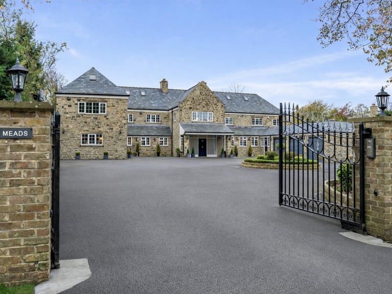 An impressive six-bedroom detached residence extending to more than 8,000 sq ft and set within around 0.75 acres of landscaped grounds. The gated property includes multiple reception rooms, a large open-plan living kitchen and a triple garage.