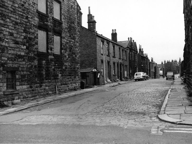 New Street in August 1968 looking from Wesley Street. The original cobbled street has been tarmaced and repaired in places.