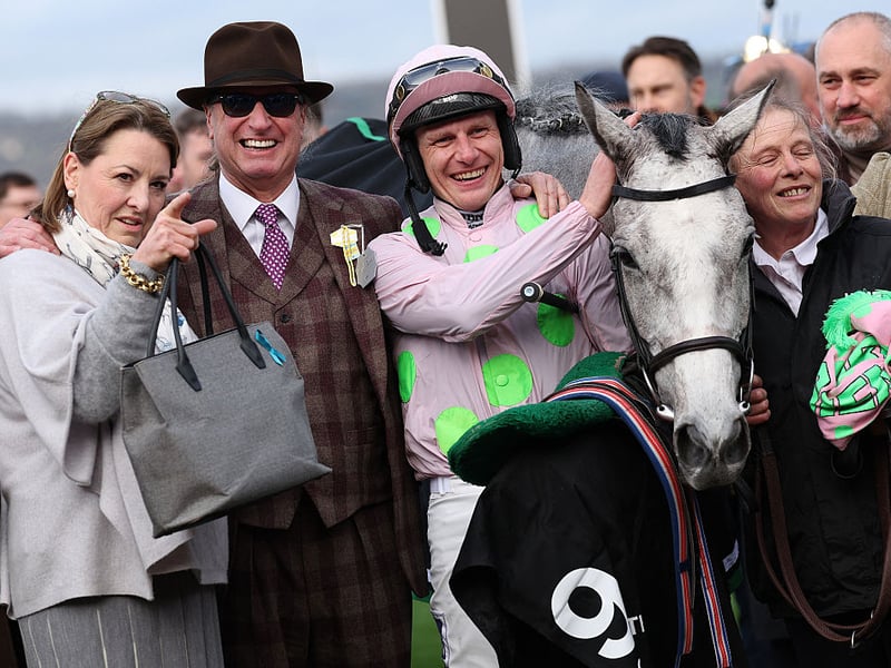 Jockey Paul Townend celebrates with owner Rich Ricci after riding Lossiemouth to win the Unibet Champion Hurdle Challenge Trophy.