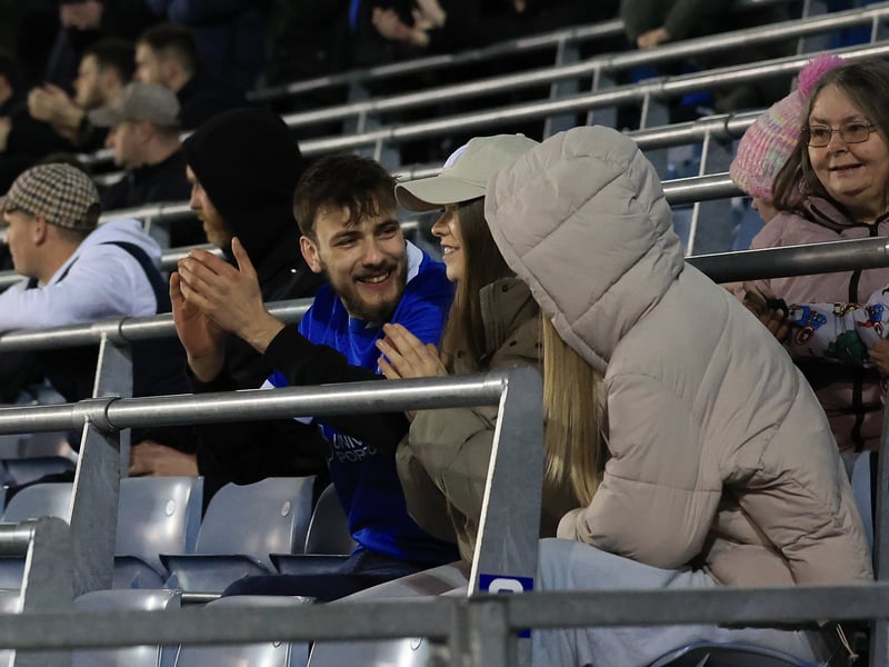 Brilliant pictures of Pompey fans backing Blues under Fratton lights against Swansea City.