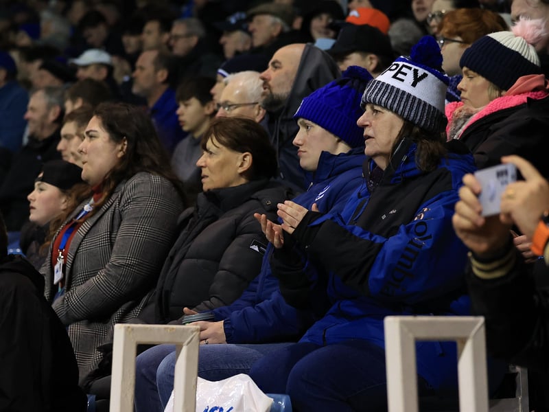 Brilliant pictures of Pompey fans backing Blues under Fratton lights against Swansea City.