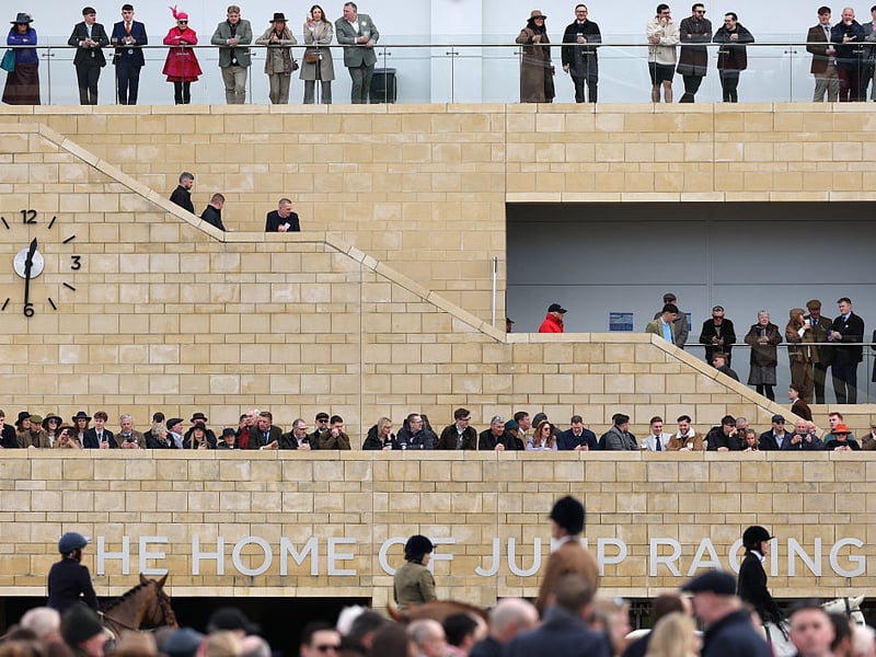 Racegoers look out over the Parade Ring.