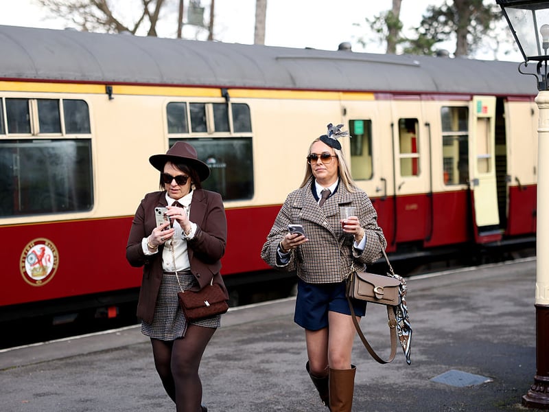 More racegoers arrive at the festival via steam train.
