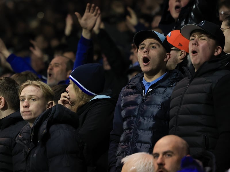 Brilliant pictures of Pompey fans backing Blues under Fratton lights against Swansea City.