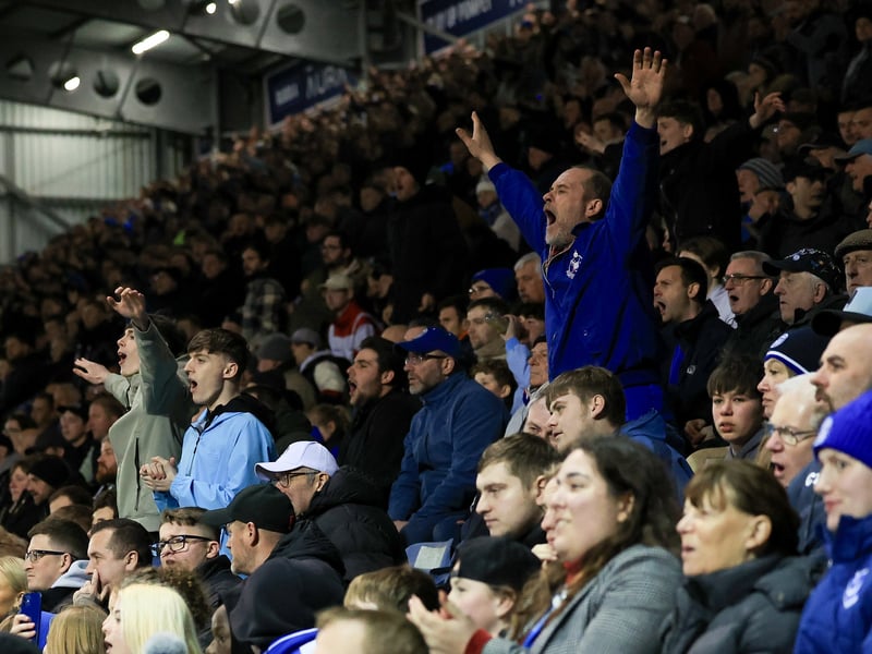 Brilliant pictures of Pompey fans backing Blues under Fratton lights against Swansea City.
