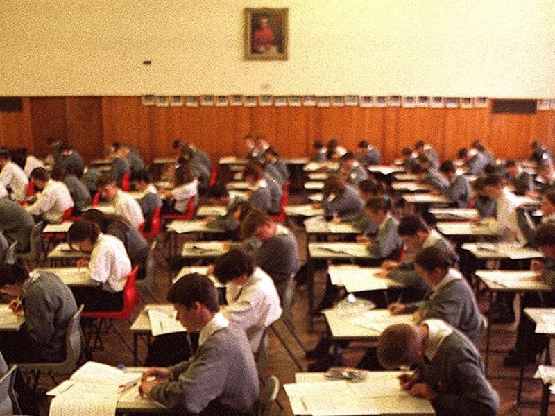 June 1998 and pupils at Cardinal Heenan High were taking exams in the school hall while the roof leaked.