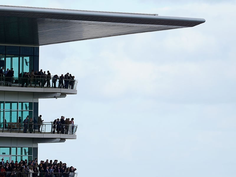 Watching from the end of the grandstand during Ladies Day.