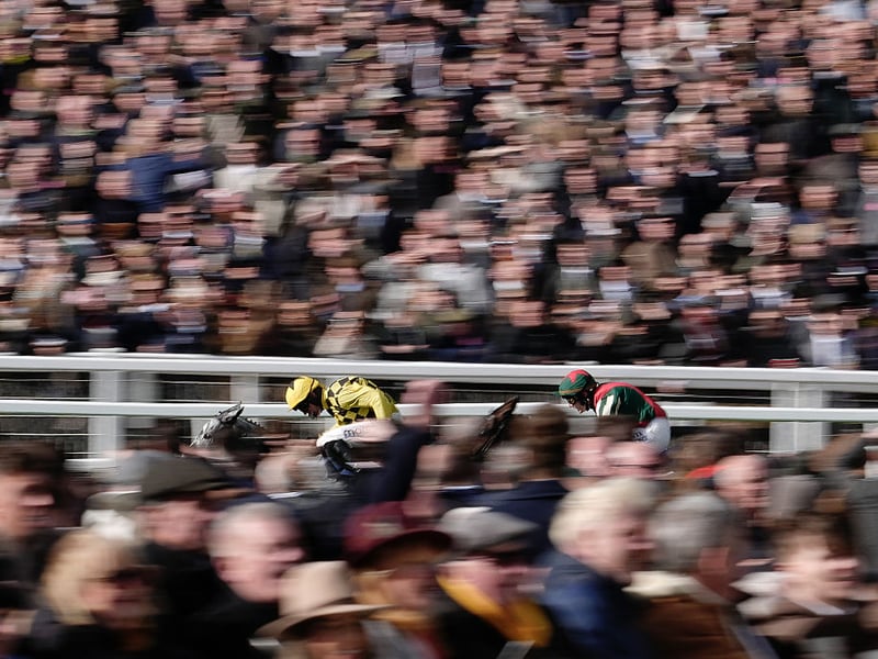 Harry Cobden riding Kitzbuhel to win The Brown Advisory Novices' Chase during Ladies Day.