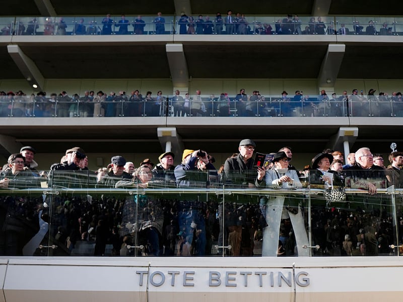 Spectators jostle for the best view.