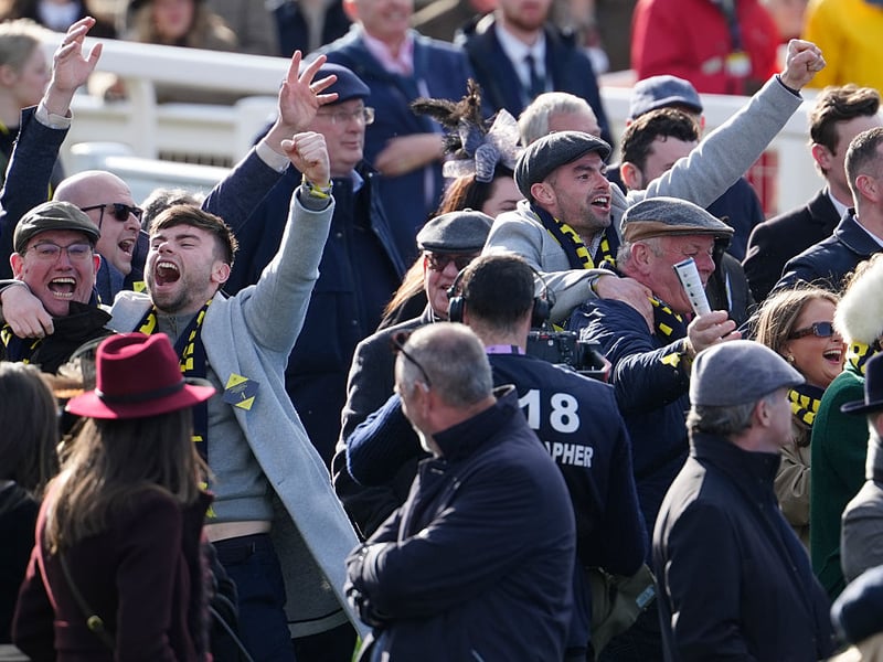 Owners celebrate in the parade ring as their Final Orders wins The Glenfarclas Cross Country Chase.