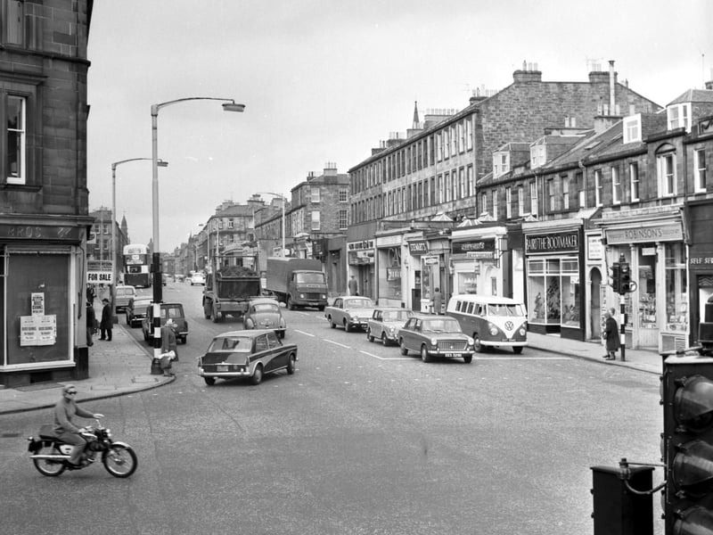 People shopping on Newington Road, Edinburgh, in October 1968, with the shops shown including Baird The Bootmaker and Crawford's the bakers