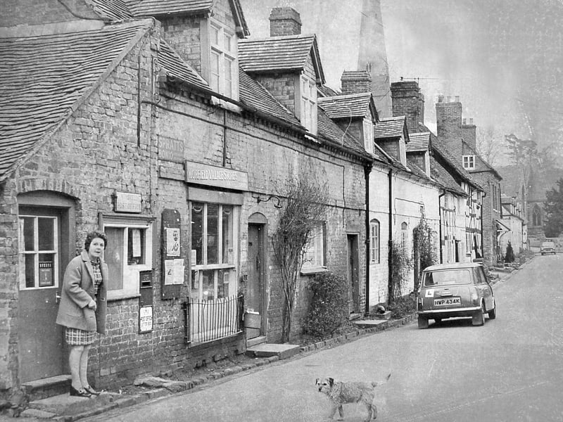 The pretty village of Worfield, near Bridgnorth, is a picture of peace with post office and shop heading a line of small cottages and the church spire overlooking the tranquil scene. March 1973.