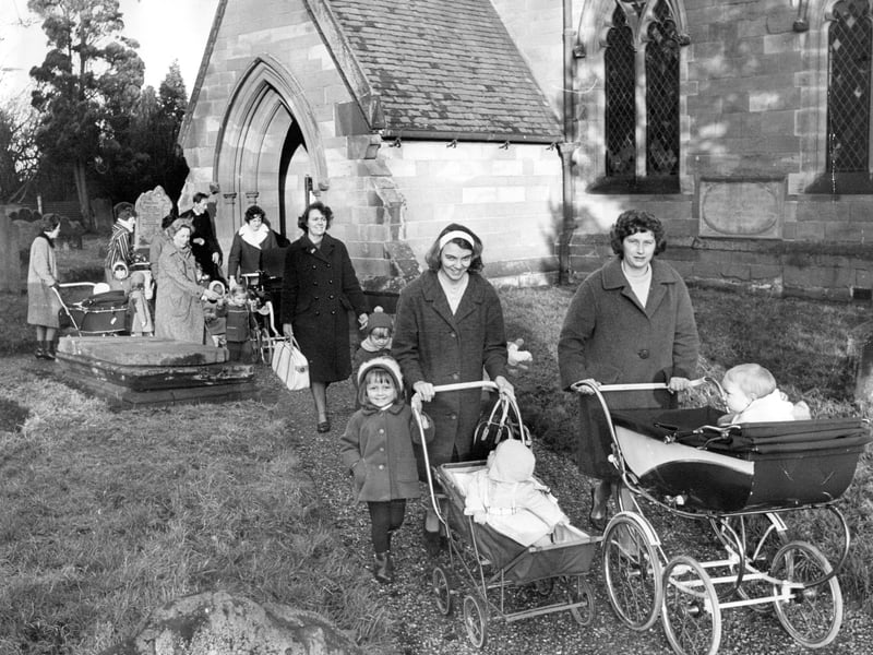 St Mary Magdalene, Albrighton, January 15, 1965. Some parts of the caption are unreadable, but we can make out the following: 'Mothers collect their prams at the parish church doorway after a service. .... population boom and a baby boom to cope with Albrighton... the vicar hopes the services will help village newcomers get to know the established residents.' 
