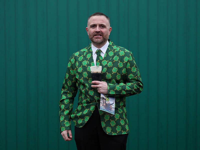Enjoying a pint of Guiness at Cheltenham.