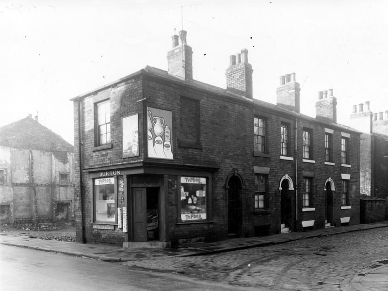 Wordsworth Street is on the left, the corner shop is number 49. This was a greengrocers, Burton is the name over the shop. Moving right is Atack Street. Pictured in December 1959.