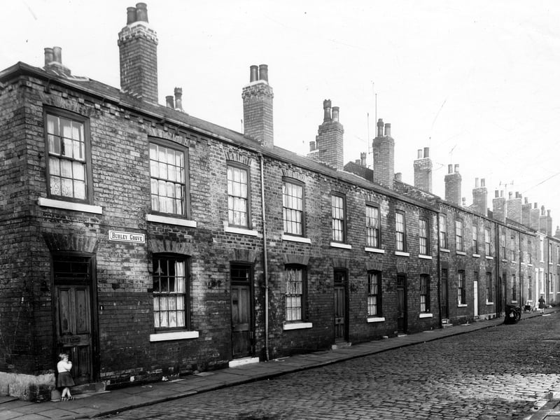 Looking up Burley Grove, odd numbered side from Bracewell Grove in the direction of St. Simon Street in December 1959.
