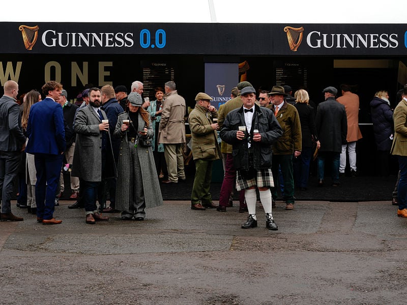 Punters queue for a drink at Cheltenham on Thursday.