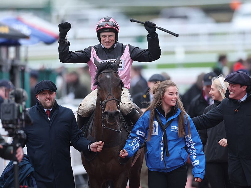 Harry Skelton celebrates riding Supremely West to victory in the Pertemps Network Final Handicap Hurdle on the third day of the Cheltenham Festival.