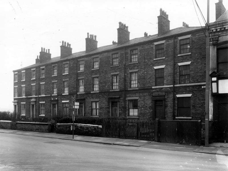 Row of ten houses on Burley Road pictured in December 1959. Number 155 is on the left, this is the junction with Ventnor Street.