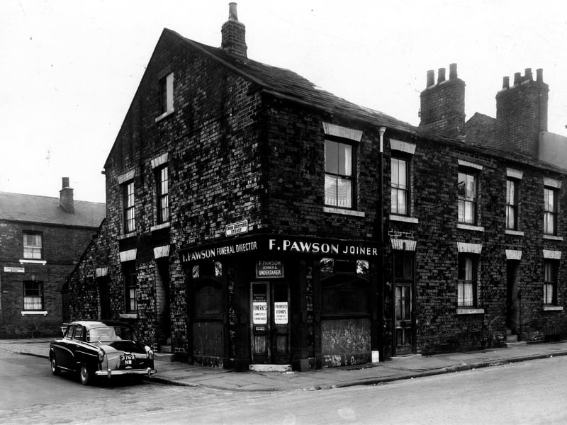 This view from November 1959 looks across Wordsworth Street, at the corner with Cross Greystone Street is F. Pawson, joiner and undertaker. This is number 1 Wordsworth Street, with 1a then 3 to the right. On the left Lower Greystone Street can be seen behind. An Austin Cambridge car is parked outside number 2 Cross Greystone Street.
