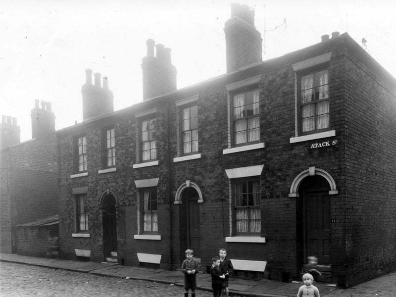 A group of boys pictured on Atack Street, looking from the corner with Greystone Street, in December 1959.
