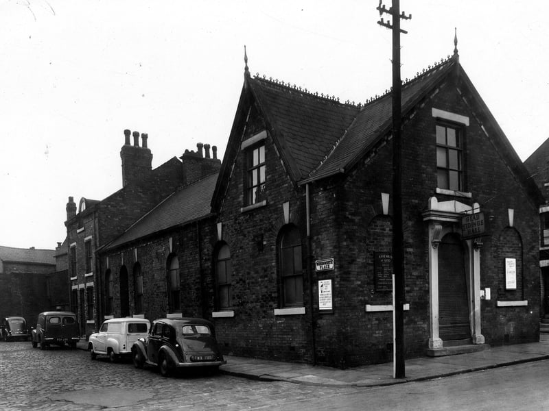 The Assembly of God meeting hall, an old sign over the door has the name 'Glad Tidings Hall'. It was on the corner of Wordsworth Place and Wordsworth Street. Pictured in November 1959.
