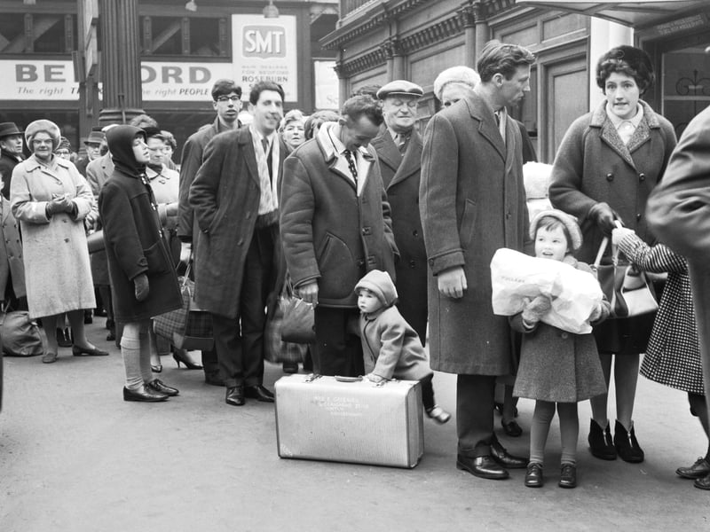 Passengers queue for the holiday special train at Waverley Station in April 1966. 